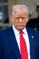 President Donald Trump Speaks with Reporters Outside Oval