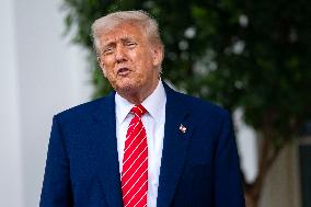 President Donald Trump Speaks with Reporters Outside Oval