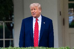 President Donald Trump Speaks with Reporters Outside Oval