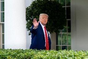 President Donald Trump Speaks with Reporters Outside Oval