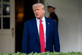 President Donald Trump Speaks with Reporters Outside Oval