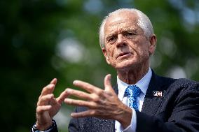 Senior Counselor Navarro Speaks with Reporters Outside West Wing