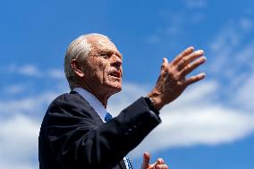Senior Counselor Navarro Speaks with Reporters Outside West Wing