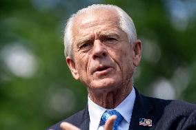 Senior Counselor Navarro Speaks with Reporters Outside West Wing