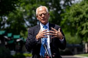 Senior Counselor Navarro Speaks with Reporters Outside West Wing