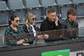 Francesco Totti with his partner Noemi Bocchi and his children Chanel and Cristian