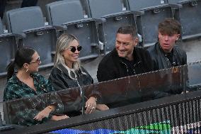 Francesco Totti with his partner Noemi Bocchi and his children Chanel and Cristian