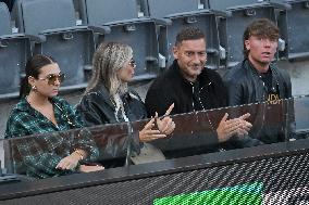 Francesco Totti with his partner Noemi Bocchi and his children Chanel and Cristian