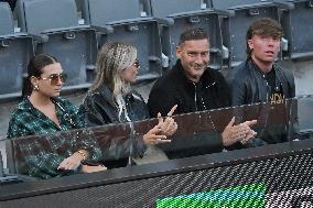 Francesco Totti with his partner Noemi Bocchi and his children Chanel and Cristian