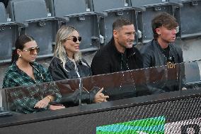 Francesco Totti with his partner Noemi Bocchi and his children Chanel and Cristian