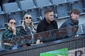 Francesco Totti with his partner Noemi Bocchi and his children Chanel and Cristian