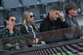 Francesco Totti with his partner Noemi Bocchi and his children Chanel and Cristian
