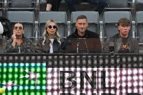 Francesco Totti with his partner Noemi Bocchi and his children Chanel and Cristian