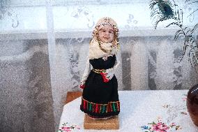 Collection of old Bulgarian towels, clothes and jewelry in Krynychne village