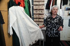 Collection of old Bulgarian towels, clothes and jewelry in Krynychne village