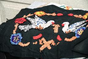 Collection of old Bulgarian towels, clothes and jewelry in Krynychne village