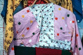 Collection of old Bulgarian towels, clothes and jewelry in Krynychne village