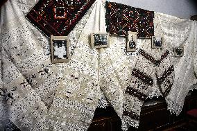 Collection of old Bulgarian towels, clothes and jewelry in Krynychne village