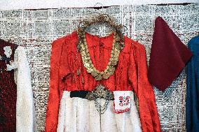 Collection of old Bulgarian towels, clothes and jewelry in Krynychne village