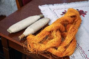 Collection of old Bulgarian towels, clothes and jewelry in Krynychne village