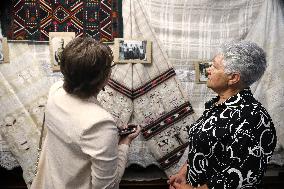 Collection of old Bulgarian towels, clothes and jewelry in Krynychne village