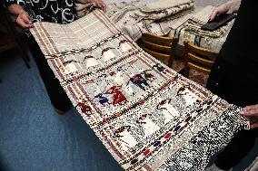 Collection of old Bulgarian towels, clothes and jewelry in Krynychne village