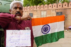 Supporters Wave Flag In Support Of Missile Strikes - India