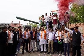 Supporters Wave Flag In Support Of Missile Strikes - India