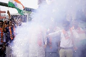 Supporters Wave Flag In Support Of Missile Strikes - India