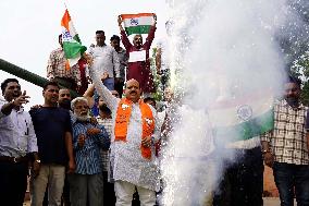 Supporters Wave Flag In Support Of Missile Strikes - India