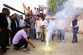 Supporters Wave Flag In Support Of Missile Strikes - India