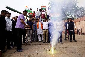 Supporters Wave Flag In Support Of Missile Strikes - India
