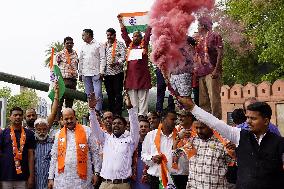 Supporters Wave Flag In Support Of Missile Strikes - India