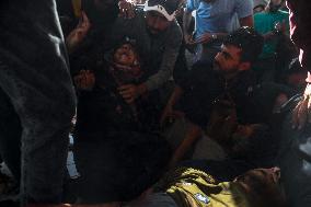 Israeli Strike On Crowded Restaurant Kills 33 And Injures Dozens - Gaza