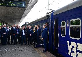 Le président français Emmanuel Macron, le Premier ministre britannique Keir Starmer et le chancelier allemand Friedrich Merz arr