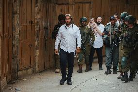 Israeli Forces Guard Settler Movement