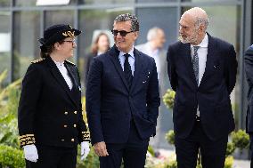 President Macron Visits EssilorLuxottica Laboratory - Wissous