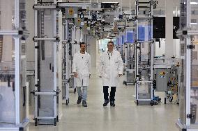 President Macron Visits EssilorLuxottica Laboratory - Wissous