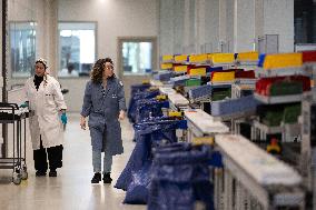 President Macron Visits EssilorLuxottica Laboratory - Wissous
