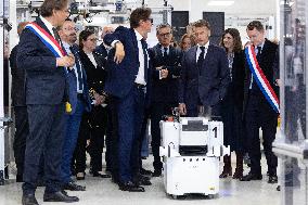 President Macron Visits EssilorLuxottica Laboratory - Wissous