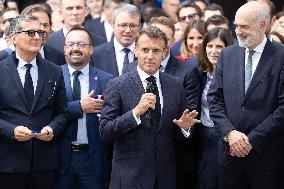 President Macron Visits EssilorLuxottica Laboratory - Wissous