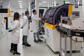 President Macron Visits EssilorLuxottica Laboratory - Wissous