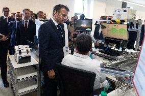 President Macron Visits EssilorLuxottica Laboratory - Wissous