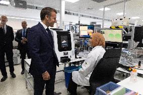 President Macron Visits EssilorLuxottica Laboratory - Wissous