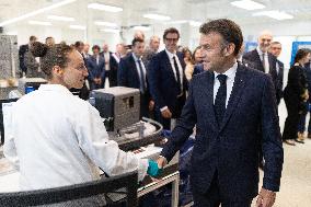 President Macron Visits EssilorLuxottica Laboratory - Wissous