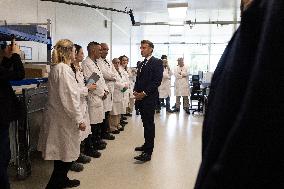 President Macron Visits EssilorLuxottica Laboratory - Wissous