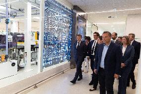 President Macron Visits EssilorLuxottica Laboratory - Wissous