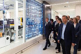 President Macron Visits EssilorLuxottica Laboratory - Wissous