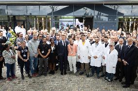 President Macron Visits EssilorLuxottica Laboratory - Wissous