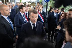 President Macron Visits EssilorLuxottica Laboratory - Wissous